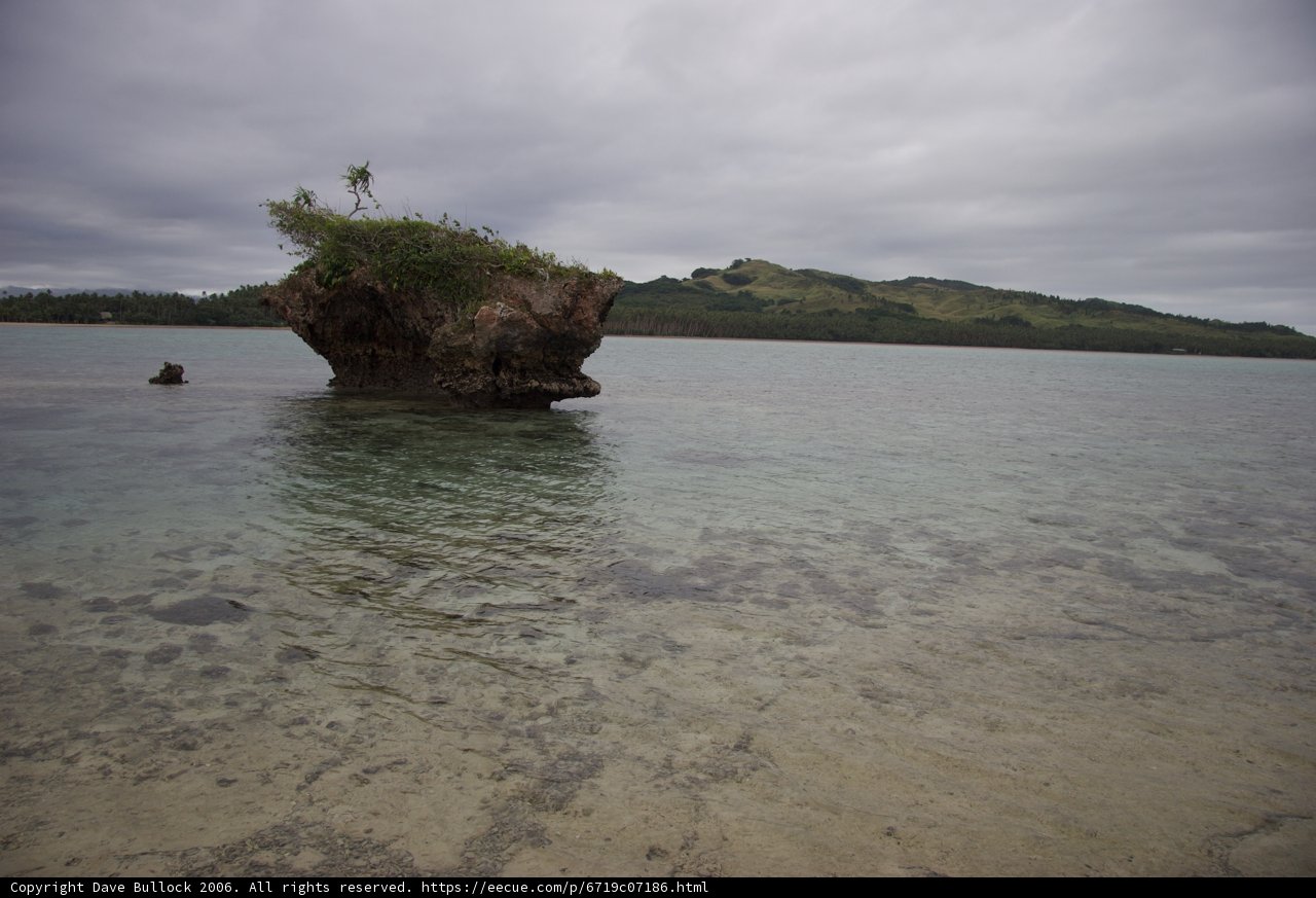 Lone Rock in the Vast Ocean