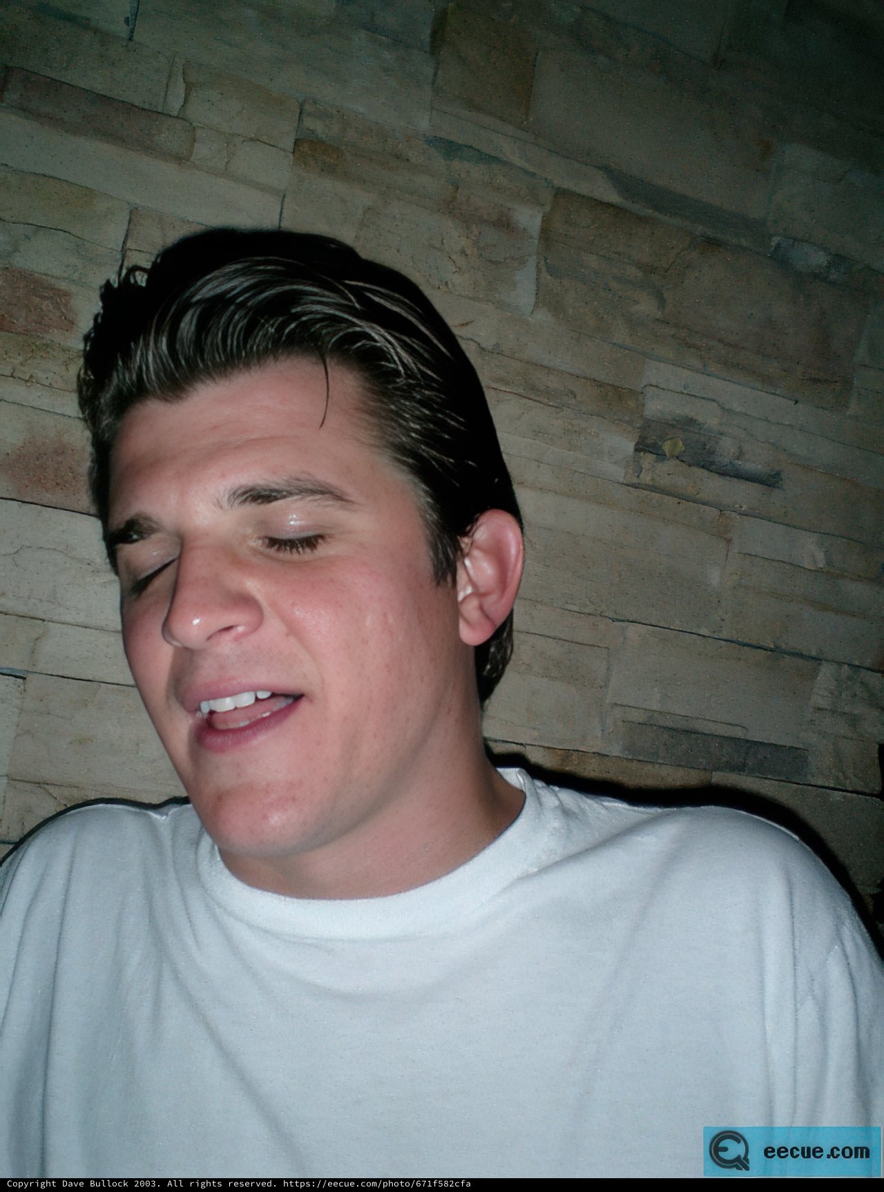 Happy Man in White T-Shirt