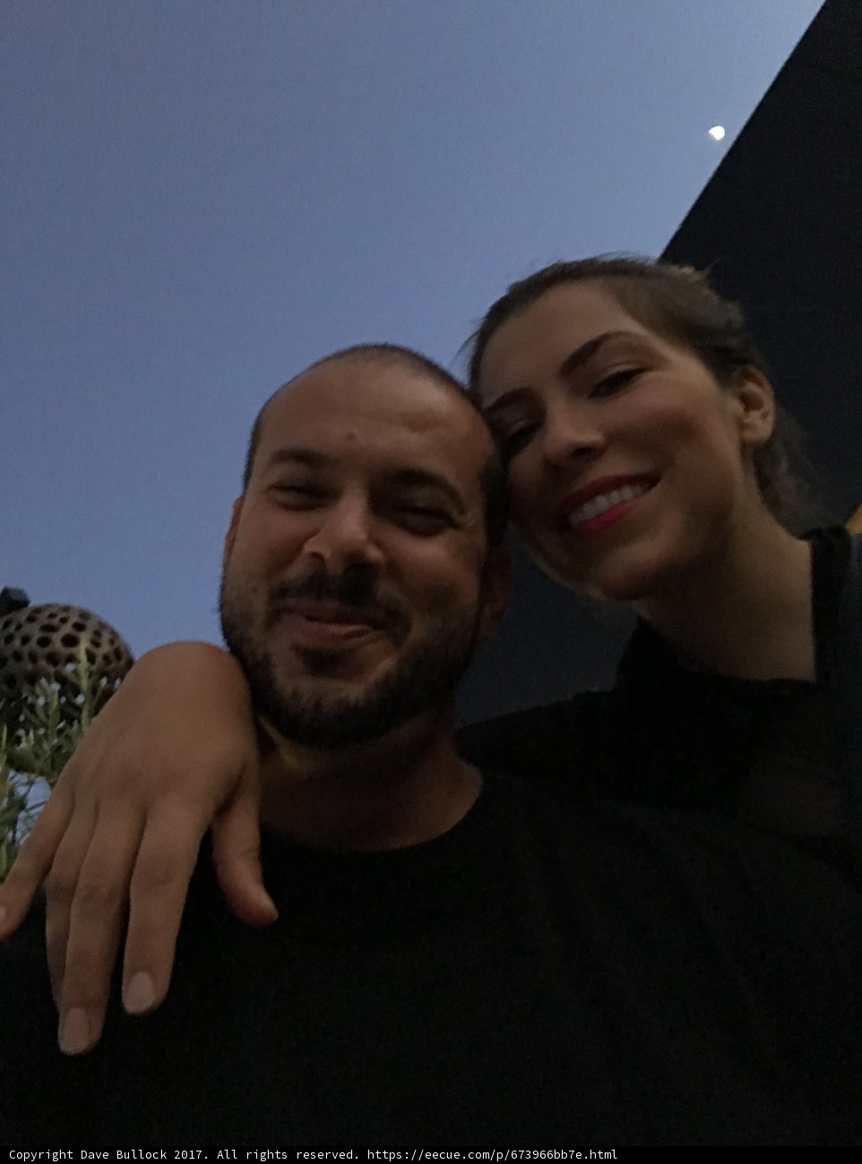 Smiling Couple under a Blue Sky