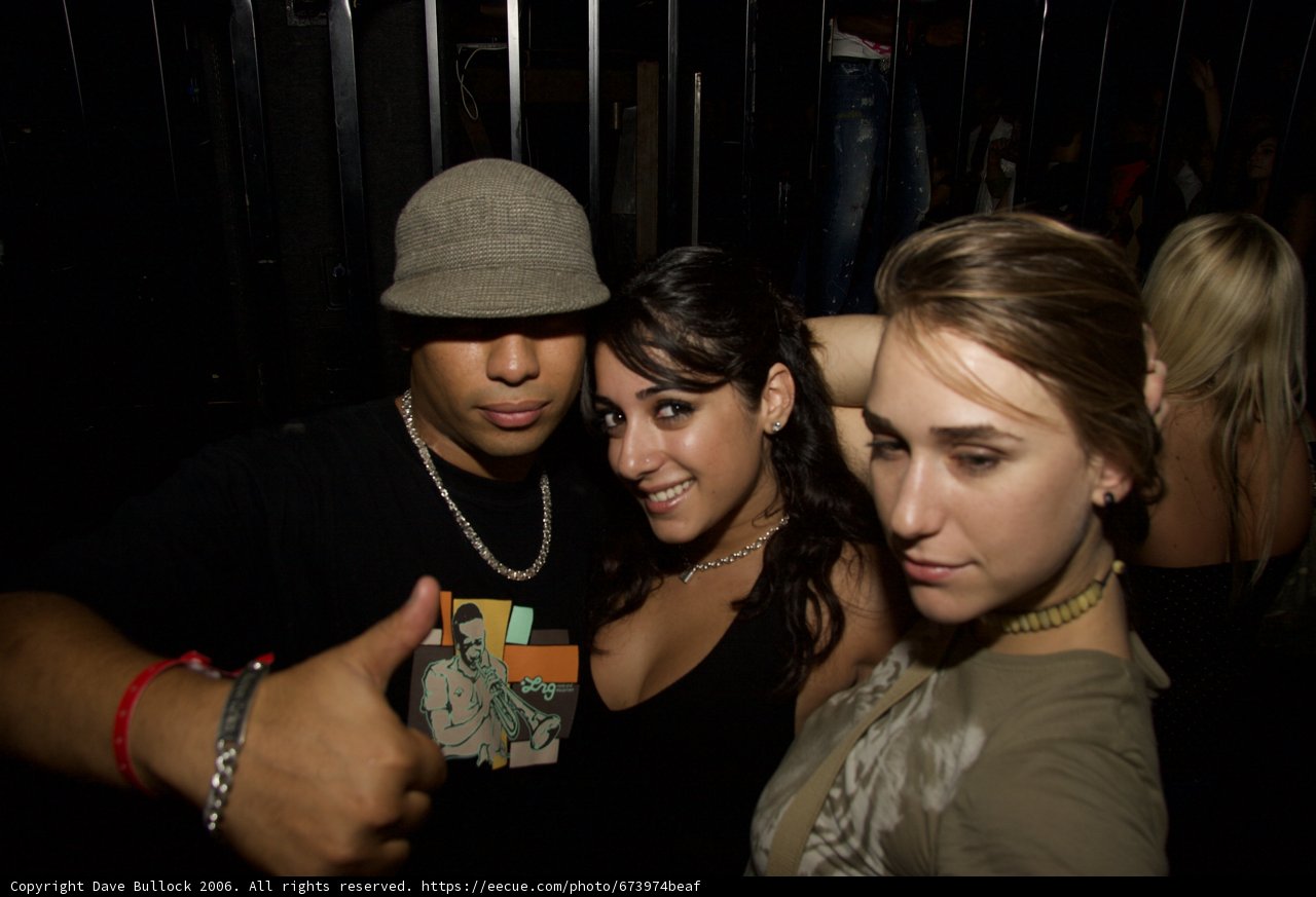 Nightclub Portrait with Fedora and Necklaces