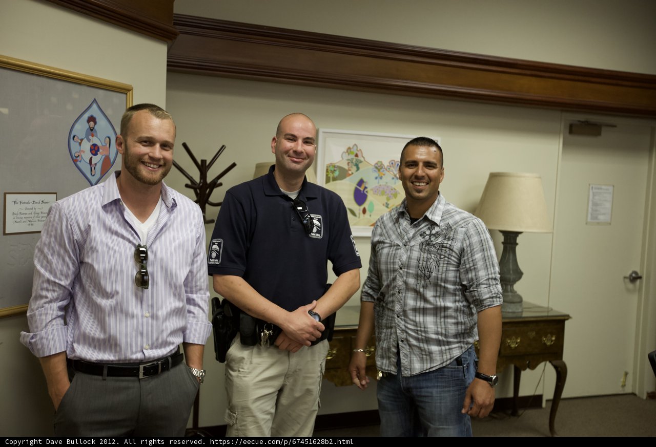 Three Men and a Smile in the Office