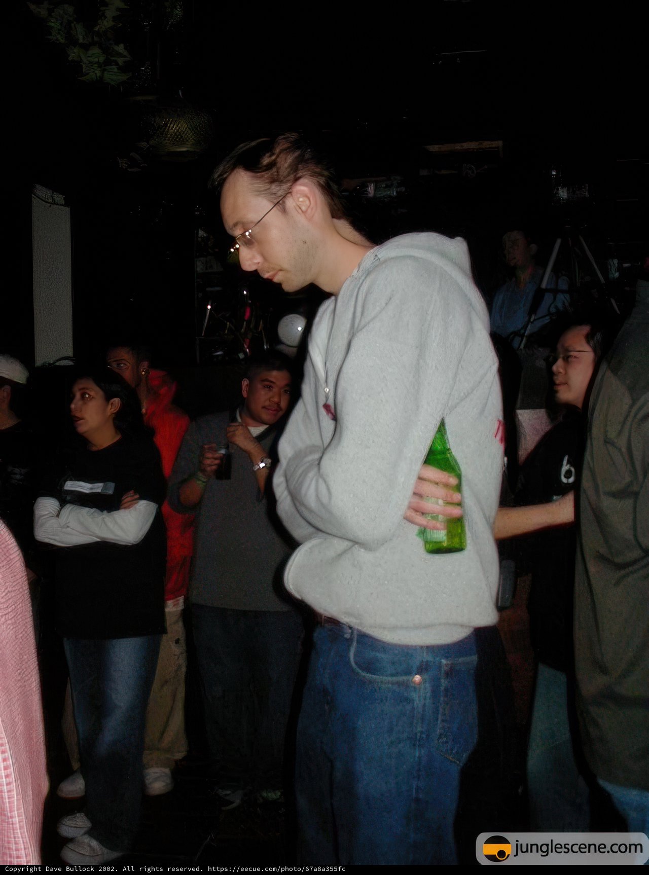 Grey Sweatshirt Man in Nightclub