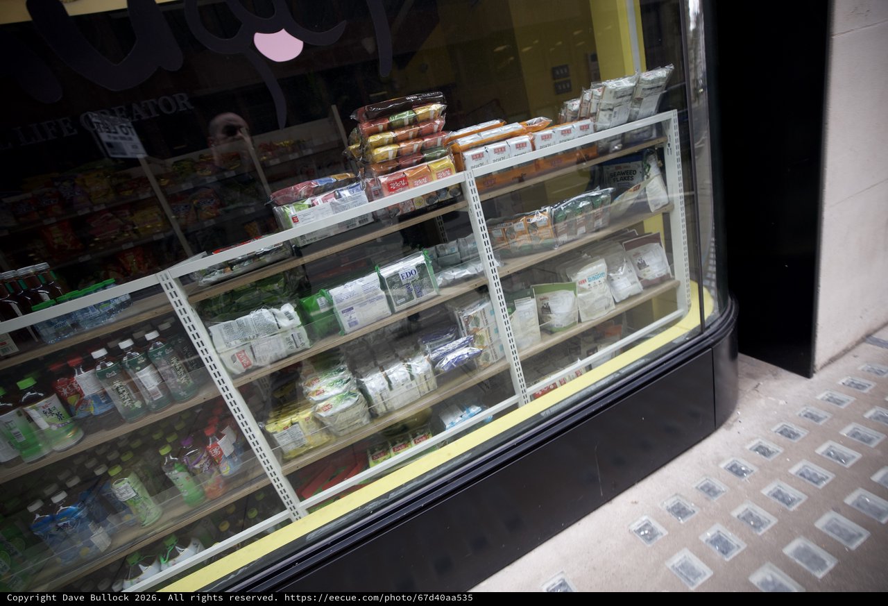 Convenience Store Refrigerated Display Window at Night