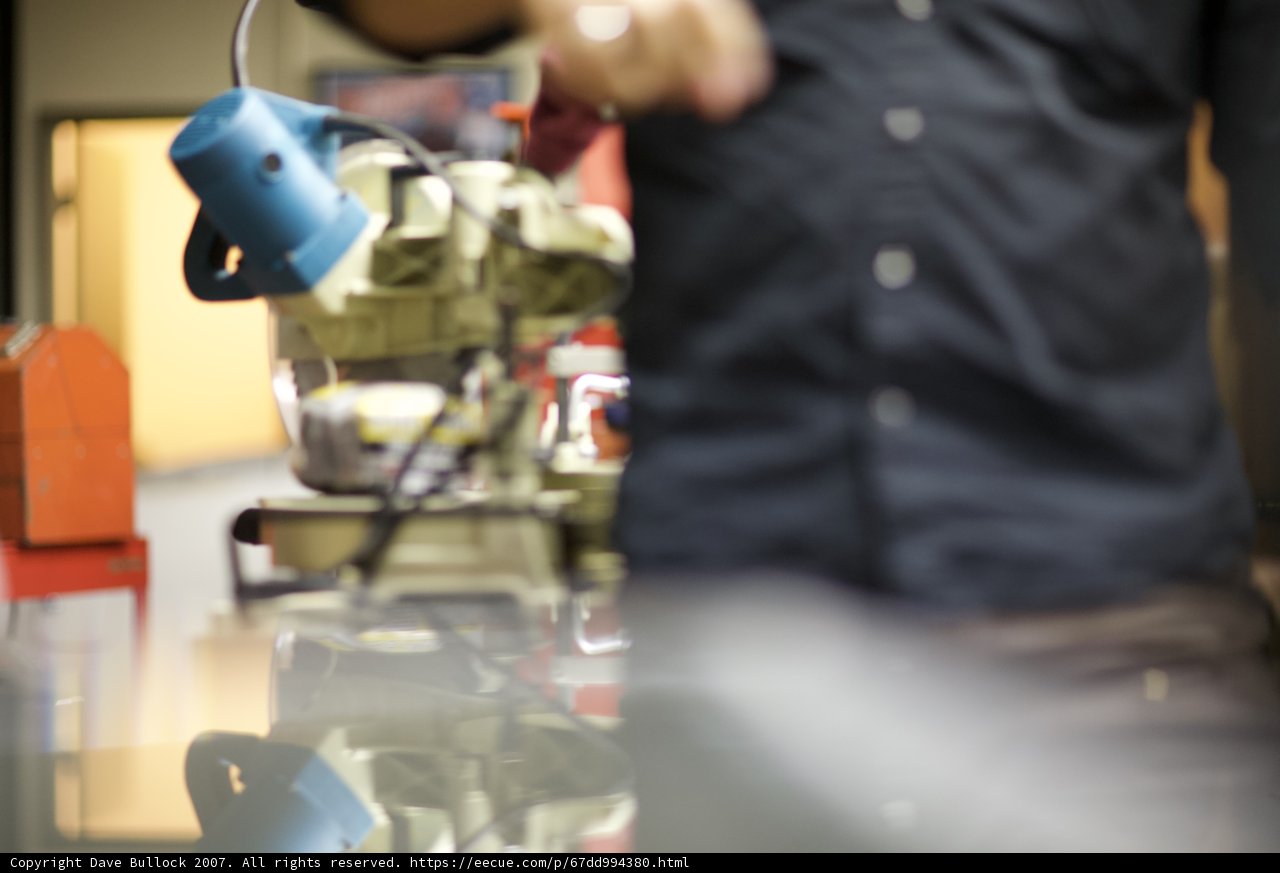 Factory Worker Operating Machine