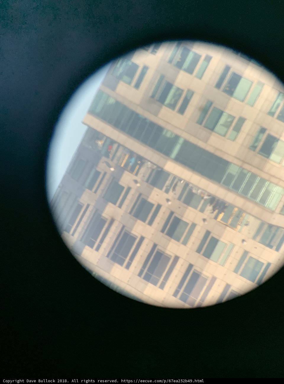 Reflection of the Spherical Building