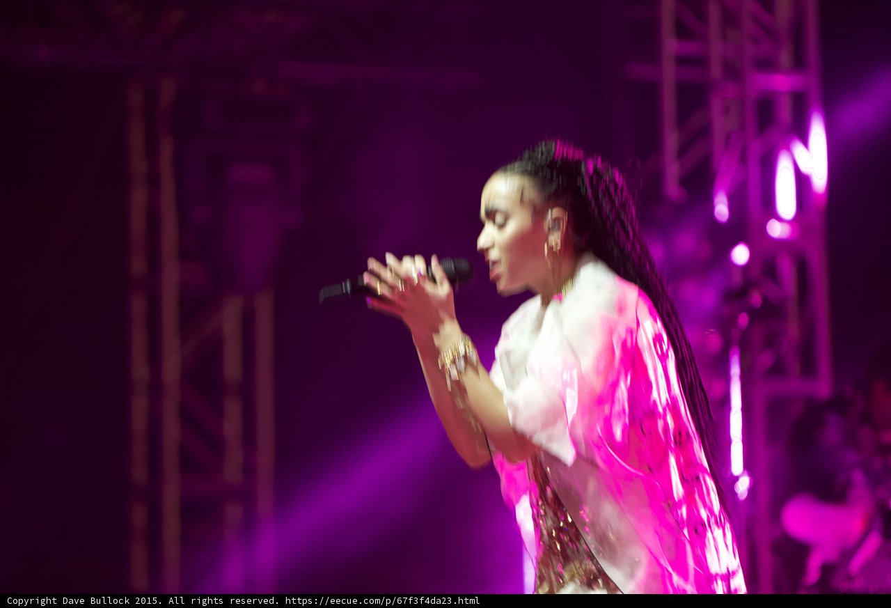 Solo Performance: A Woman with Dreadlocks Rocking the Coachella Stage