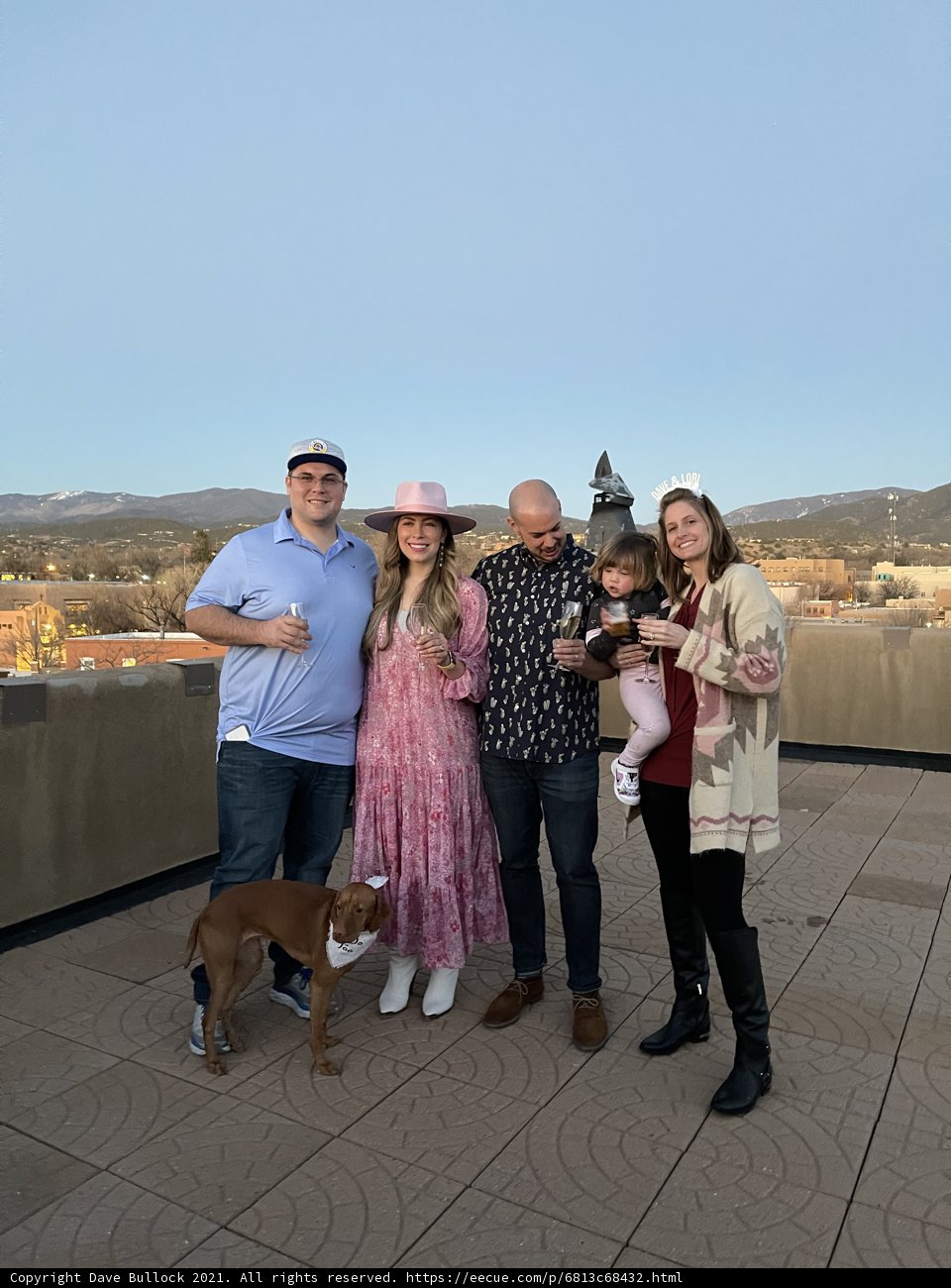 Family and Furry Friend Rooftop Portrait