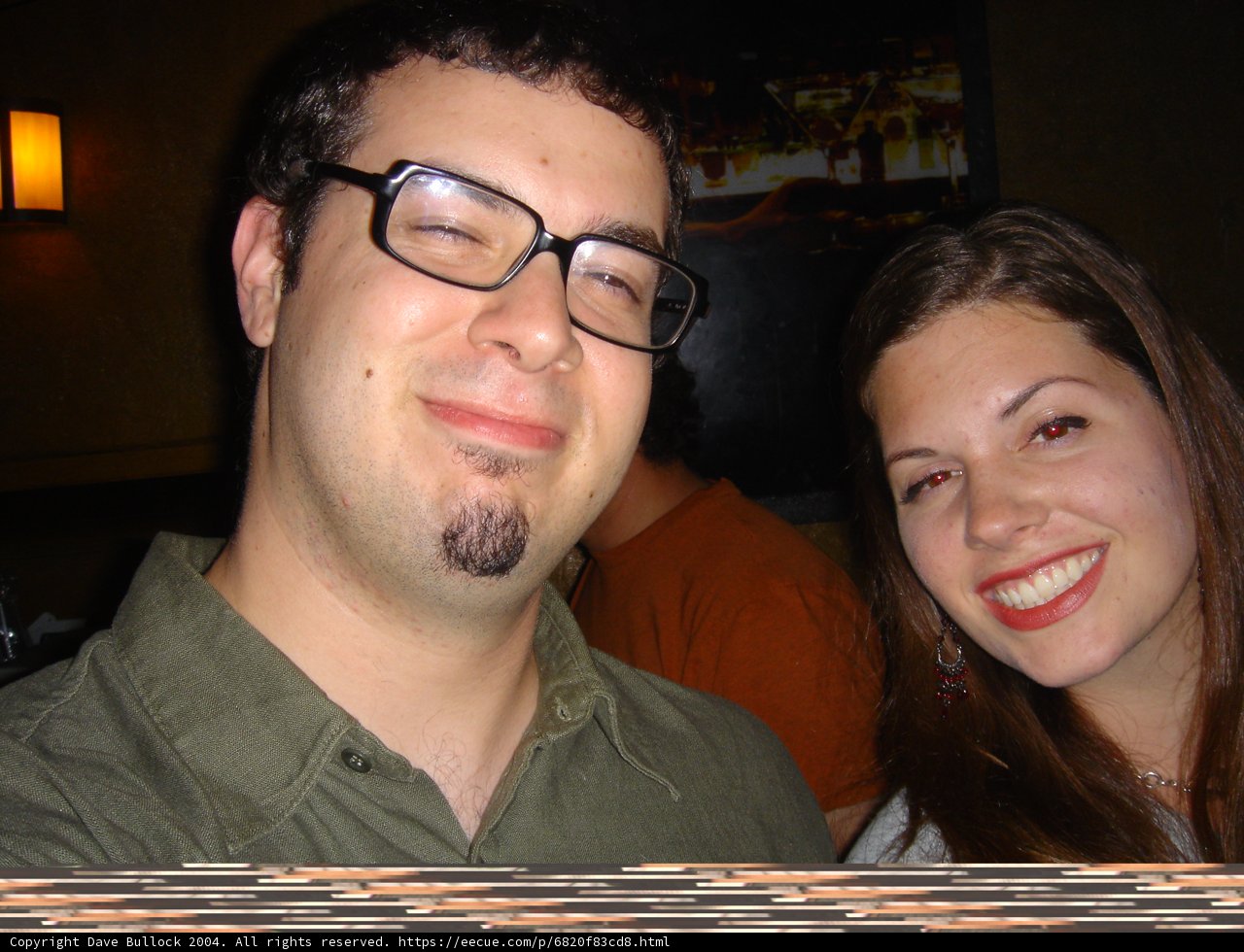 A Smiling Couple with Glasses