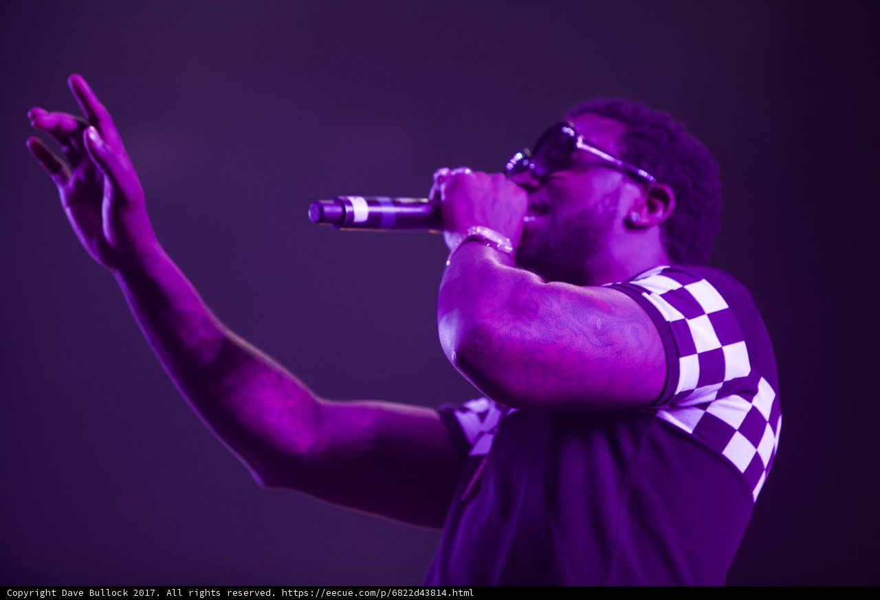 Solo Performance Under Purple Lights