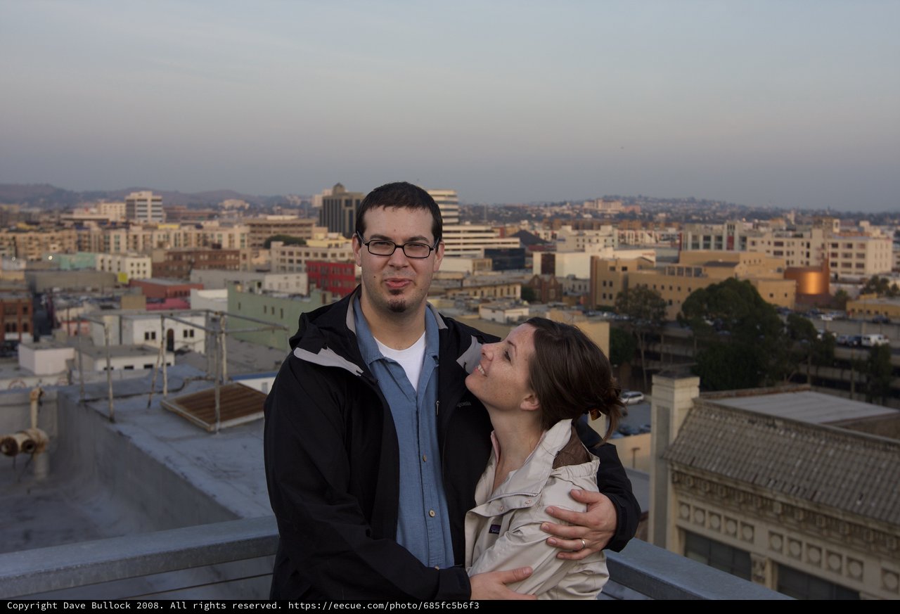 Rooftop Romance Above the City at Dusk