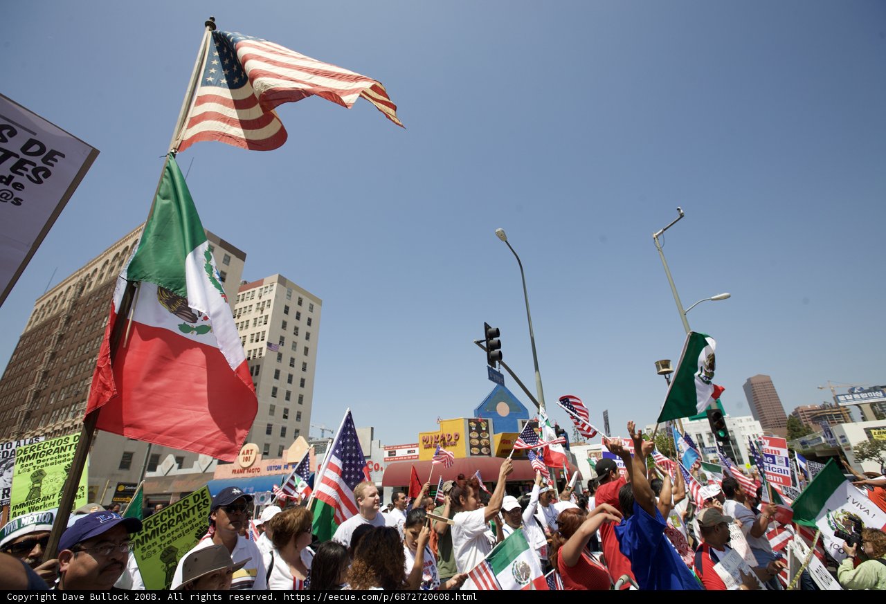 Mayday Rally Protesters Hold Flags High