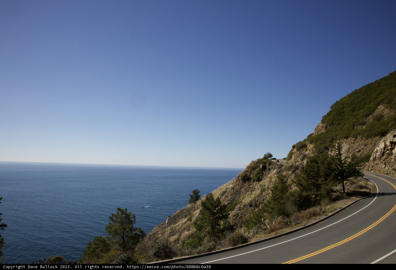 Embracing Serenity - Mountain, Road, and Sea