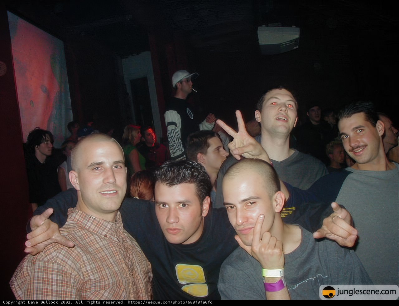 Group of Men Having Fun at a Nightclub Party