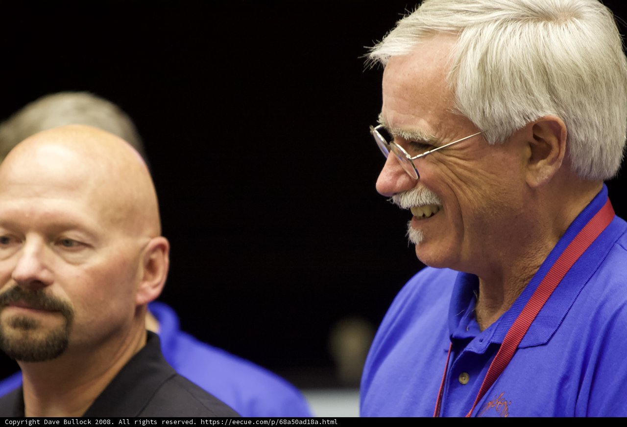 Smiling Blue-Shirted Men