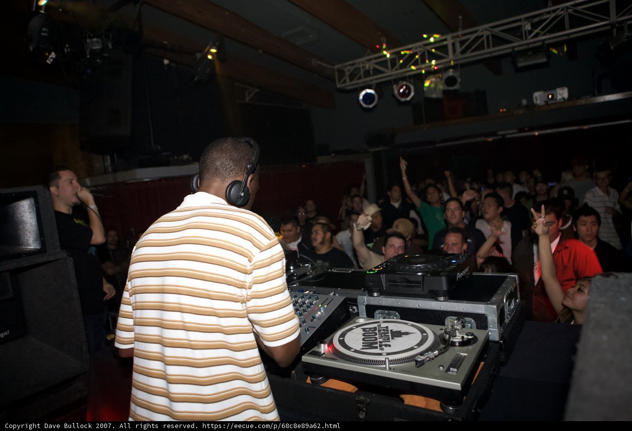 Nightclub Beats: DJ Kenny Ken Entertaining the Crowd