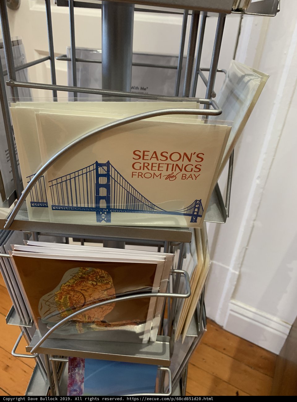 Greeting Cards Displayed on a Wooden Bridge Shelf