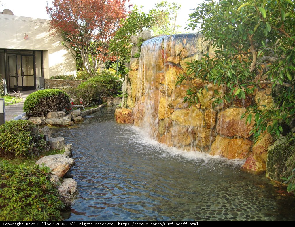 Serene Waterfall in A Garden Oasis