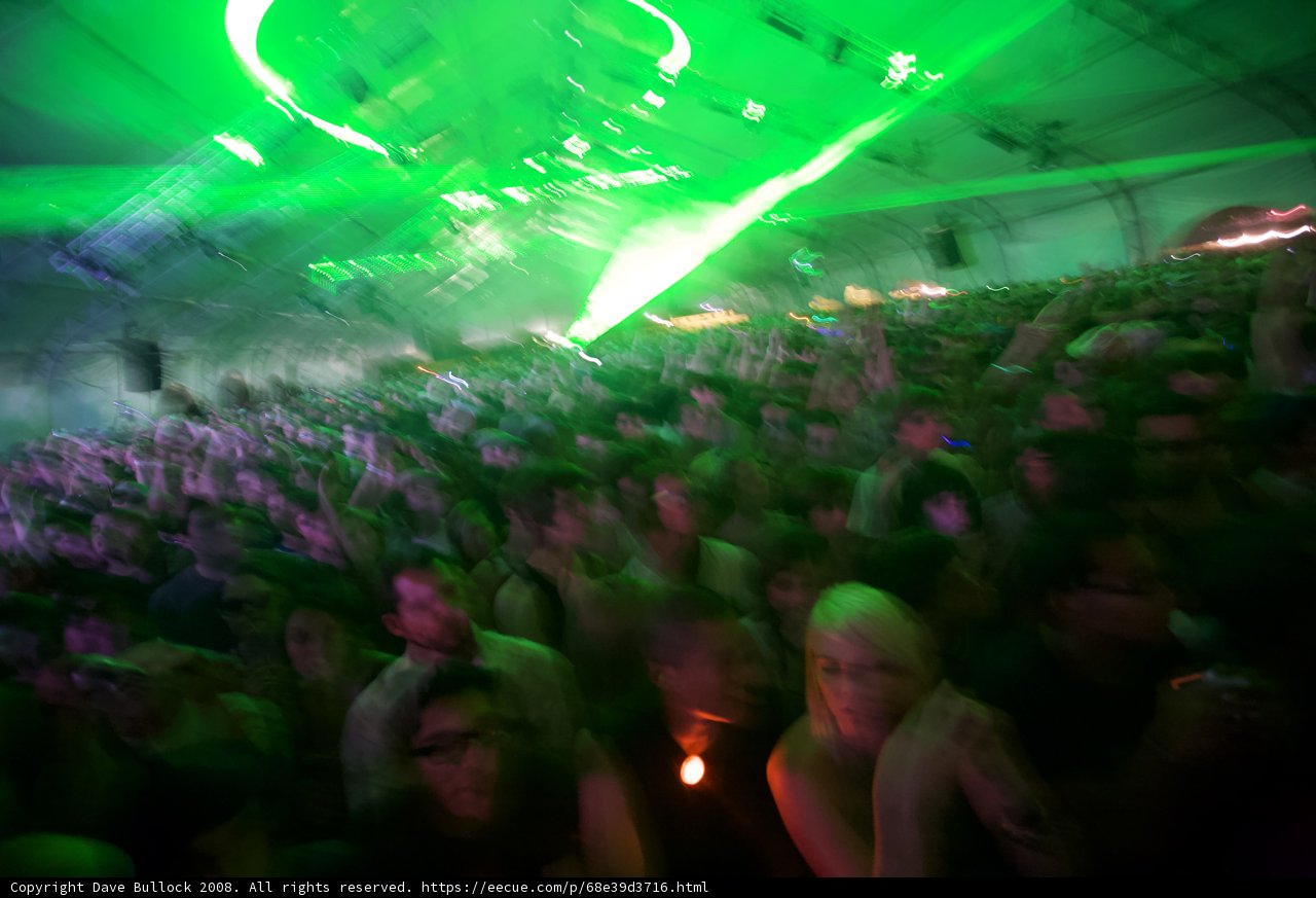 Green-Lit Concert Crowd