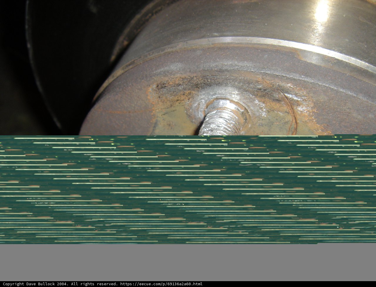 Rusty Metal Wheel with Screw Detail