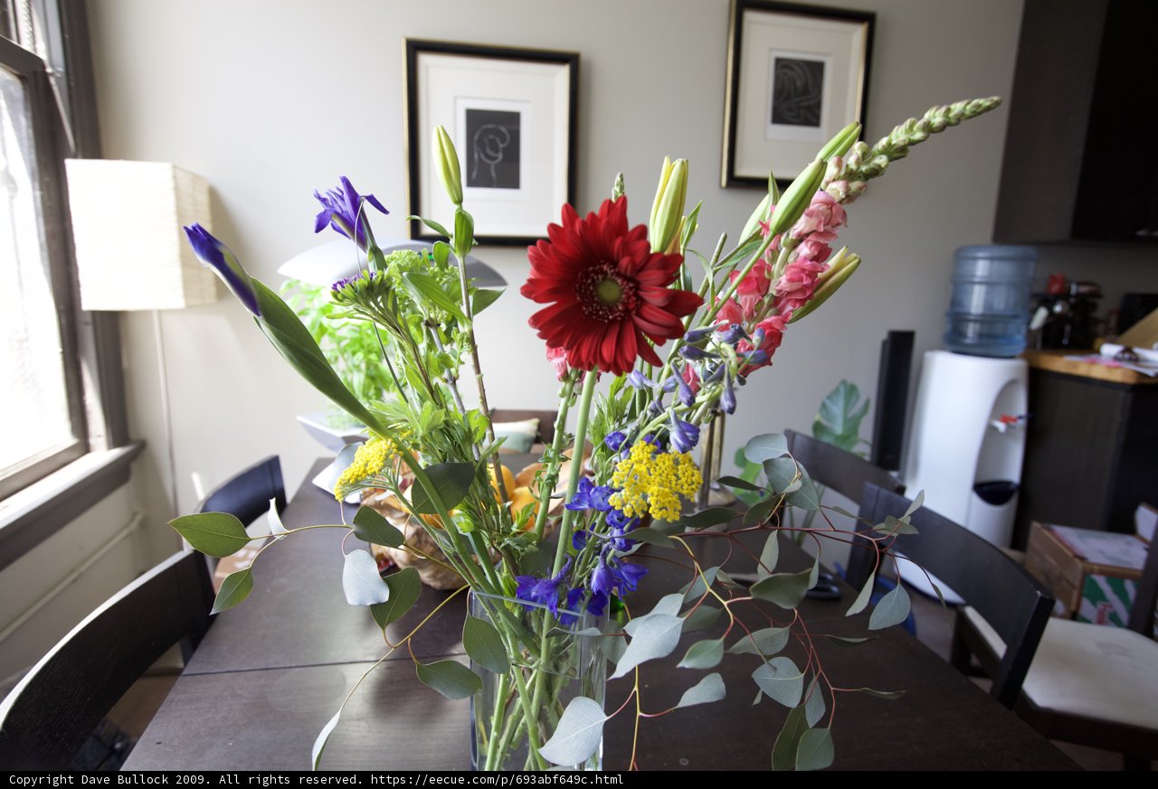 Delicate Flower Arrangement on Wooden Table