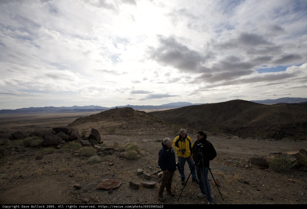 Three Adventurers on a Cloudy Hill