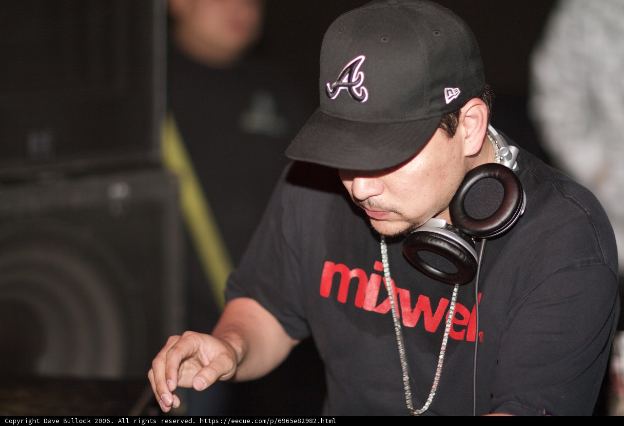Party DJ Craze Rocks a Baseball Hat and Headphones
