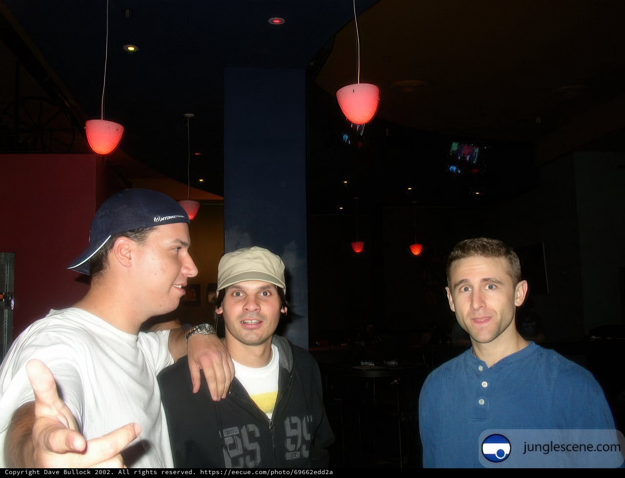 Three Men Enjoying a Night Out at the Bar