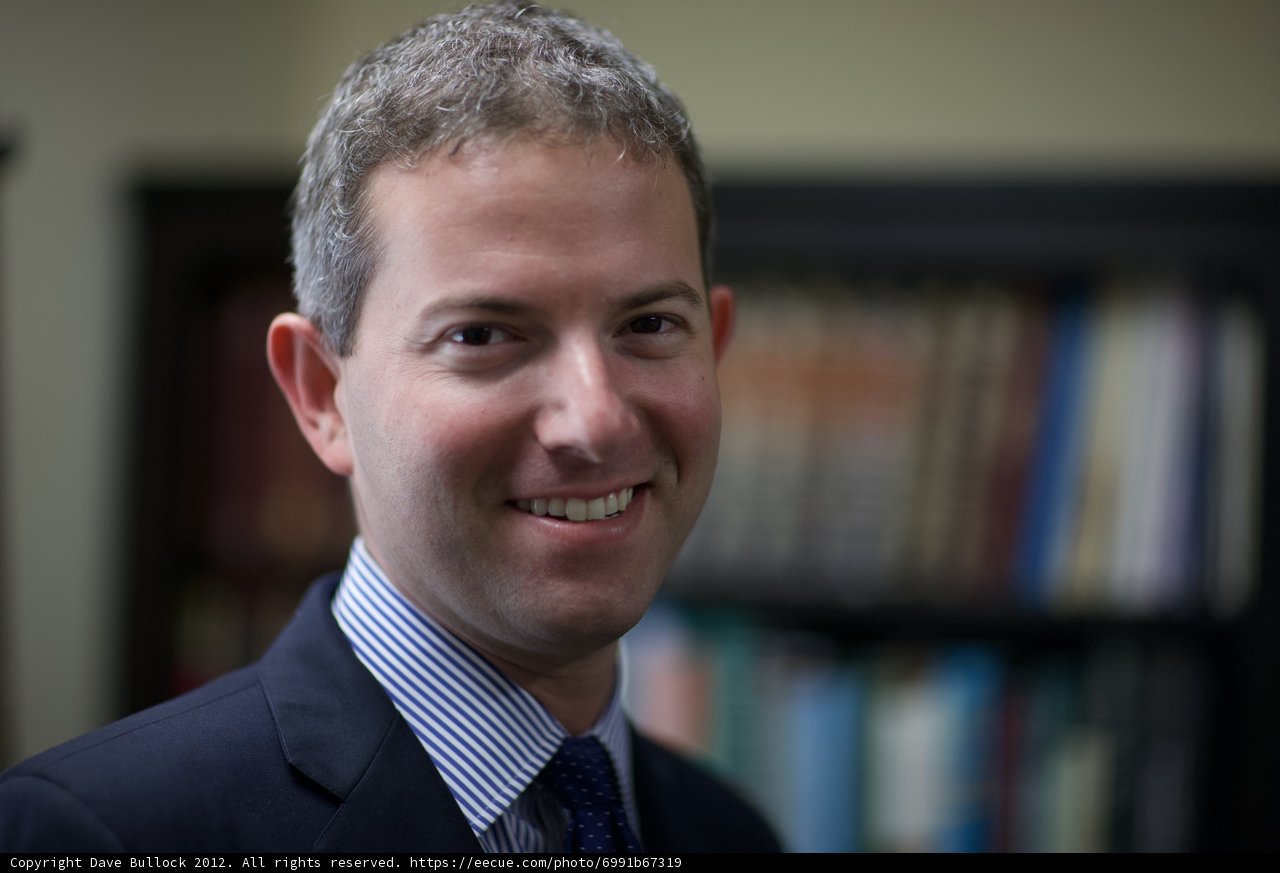 The Happy Man in a Suit
