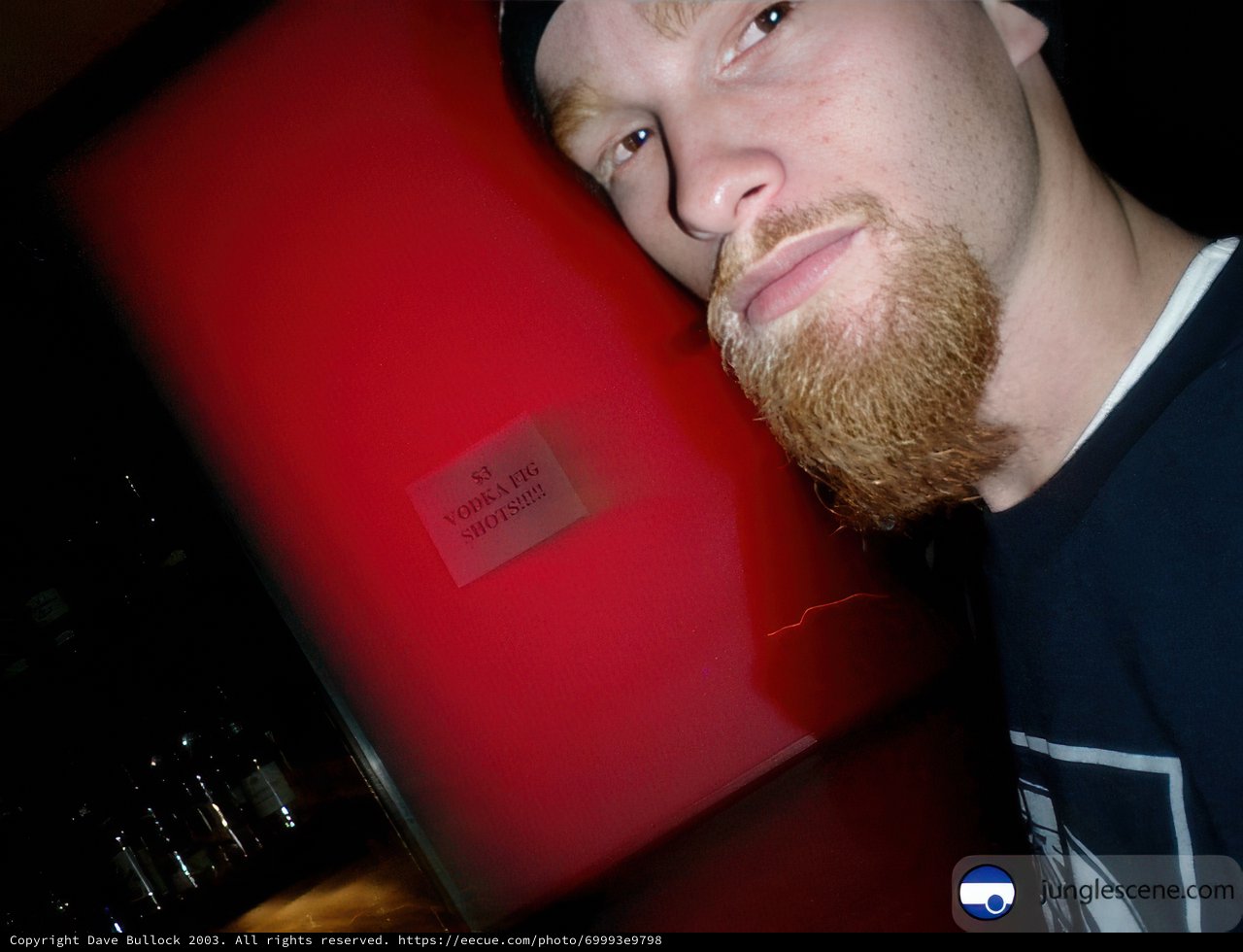 Red-Lighted Portrait of a Bearded Man