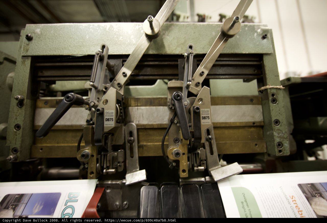 Heavy metal machine in a bustling factory