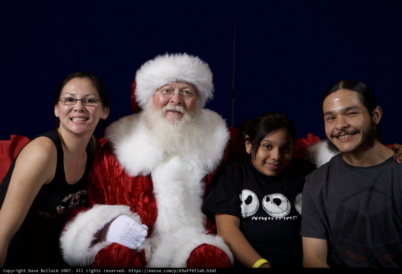 A Festive Family Photo with Santa Claus