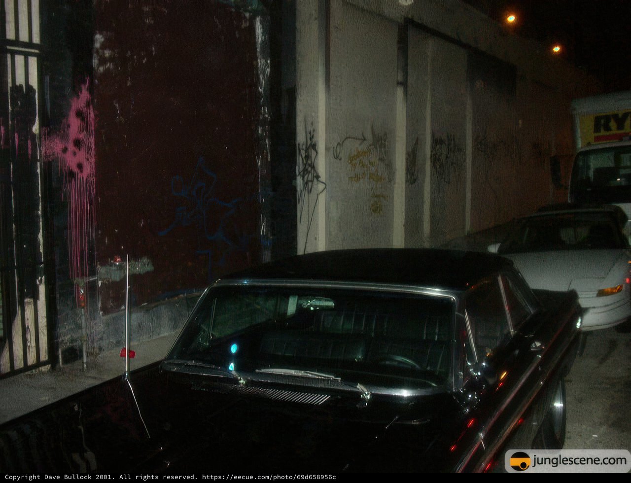 Graffiti and a Black Car