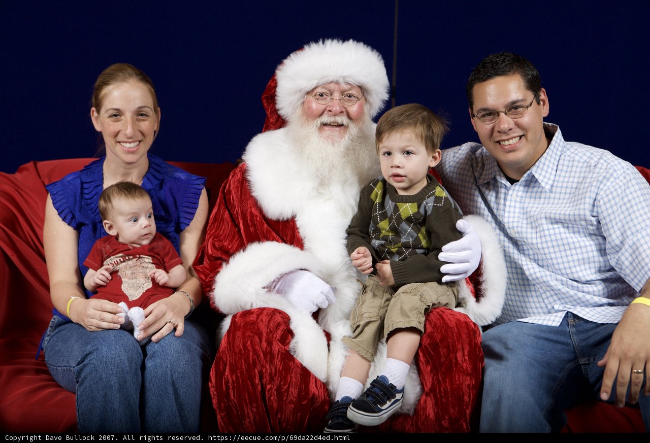 The Family's Festive Photo with Santa