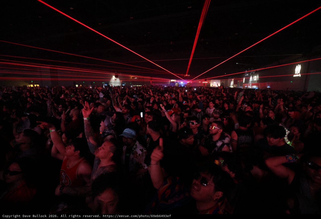 Red Laser Light Show Over Massive EDM Festival Crowd
