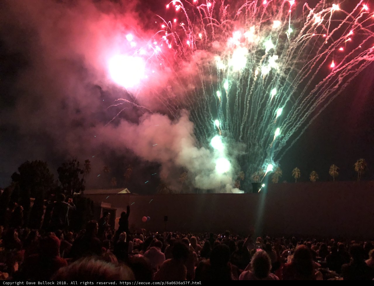 Explosive Sky over the Concert Crowd
