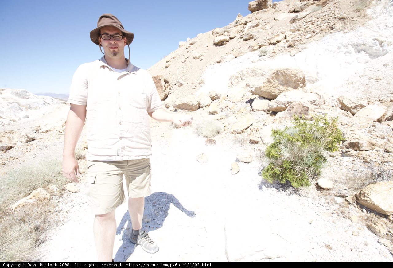 Hat and Glasses on a Rocky Path