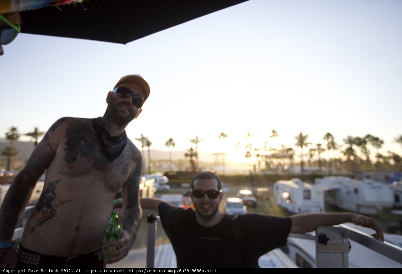 Two Tattooed Men Pose for the Camera