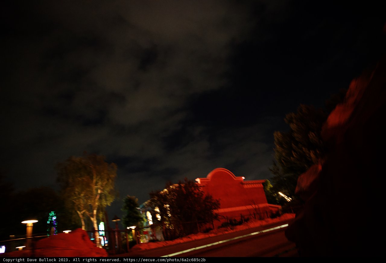 Mystical Red Building under Starless Skies