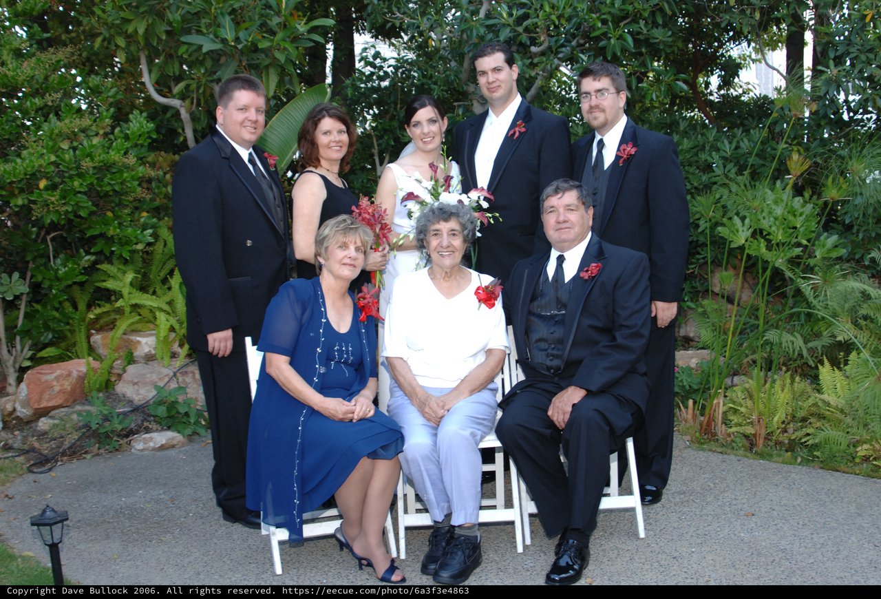 Family Wedding Portrait in Lush Garden Setting