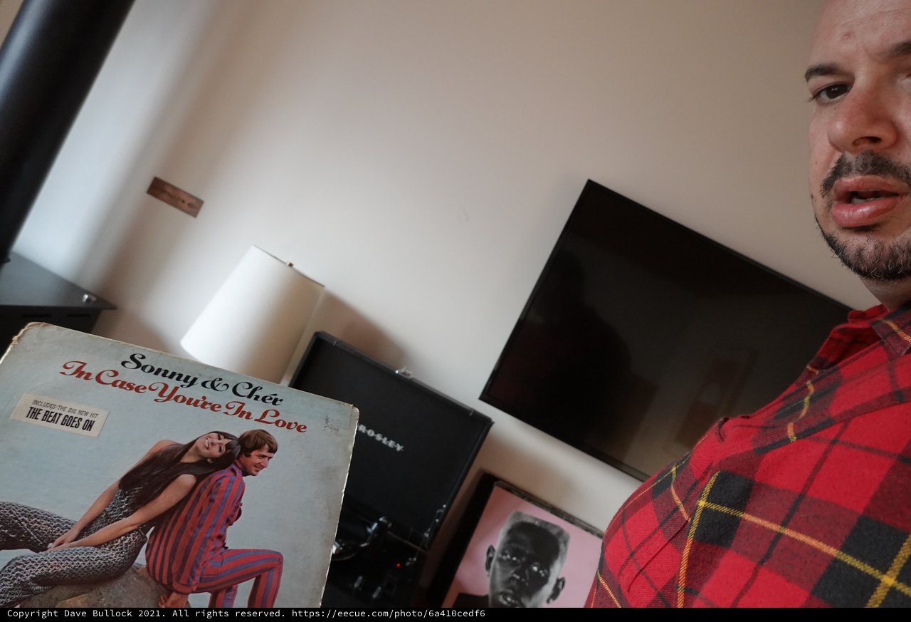 Man Showing Vintage Sonny & Cher Album