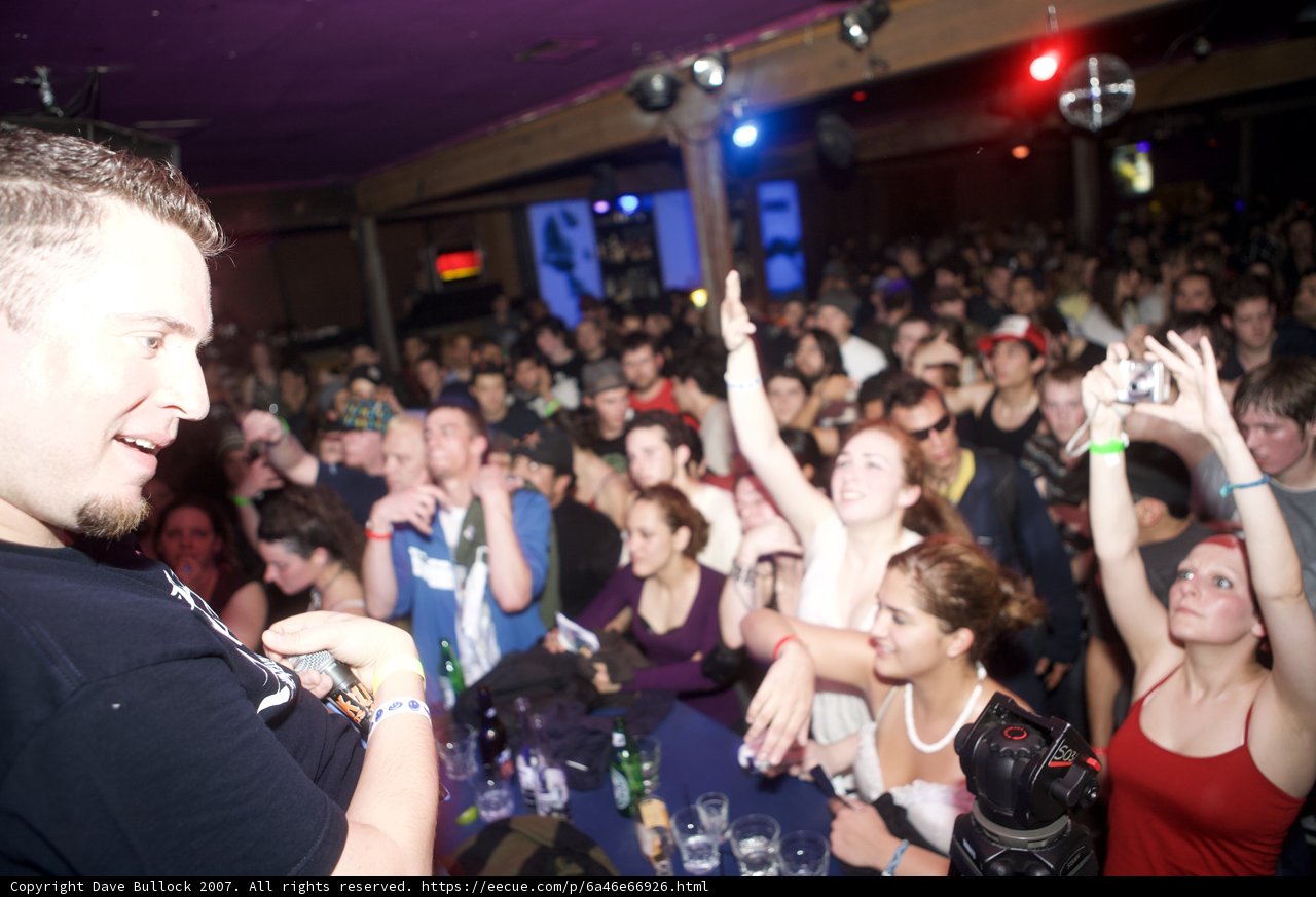 Urban Night Club Scene: Black Shirt Man Commands Respect from the Crowd