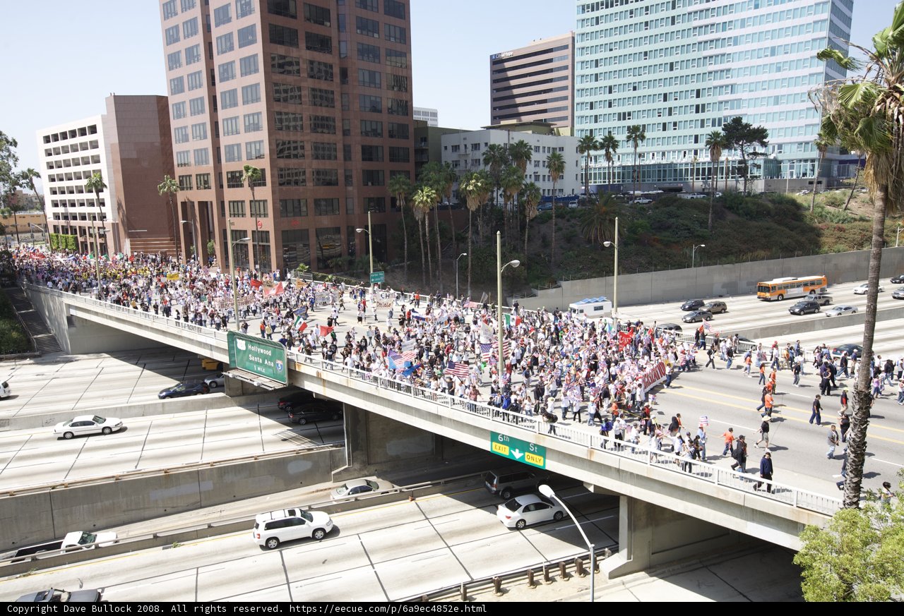 Mayday Rally: A Sea of People on a City Bridge
