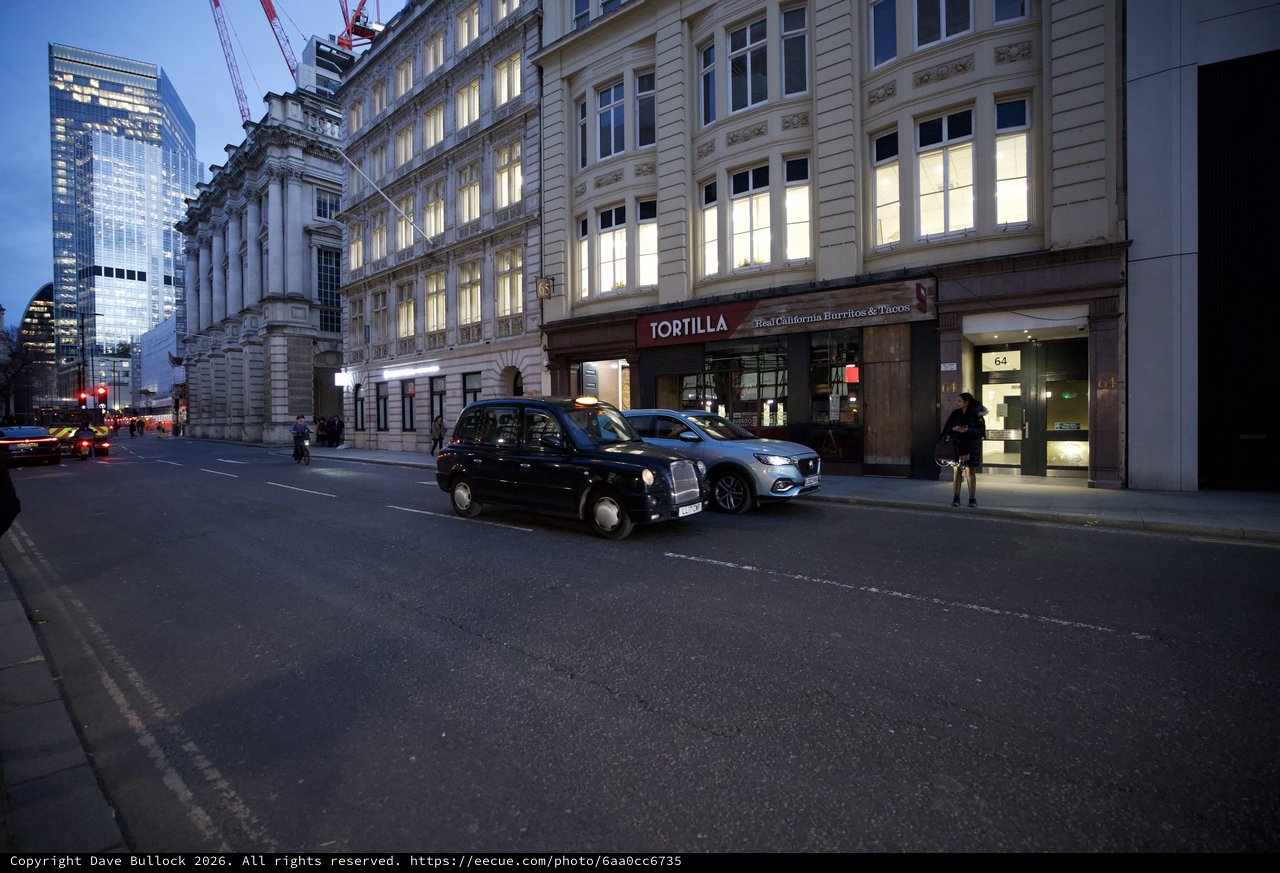Evening Traffic on London Street at Twilight