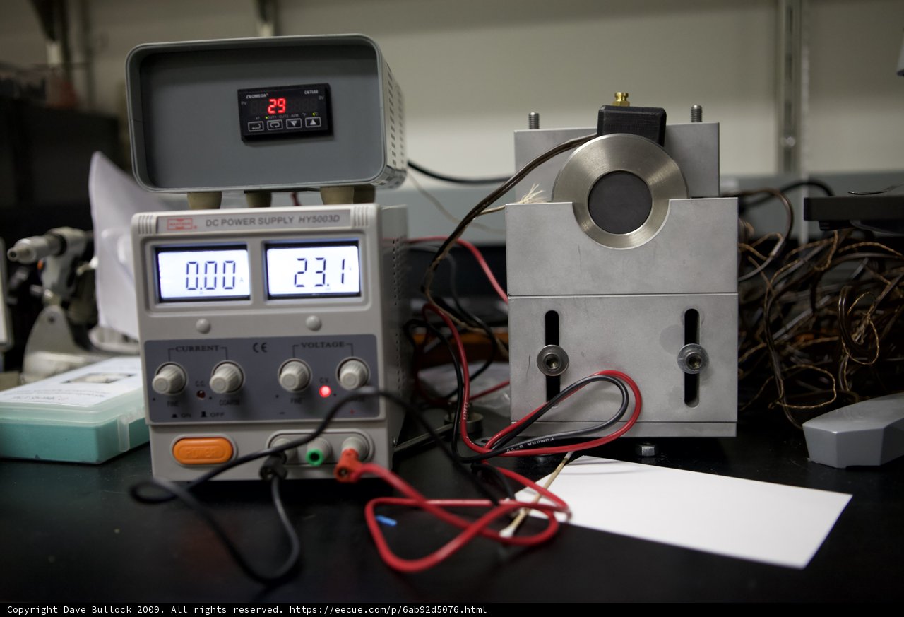 Digital Display and Voltmeter on a Table