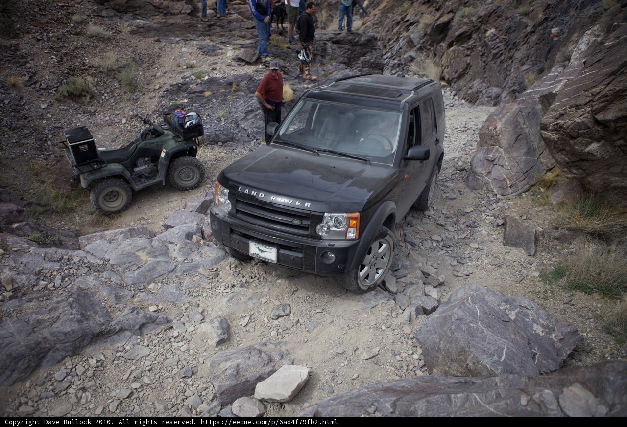 Black Land Rover on a Rocky Adventure