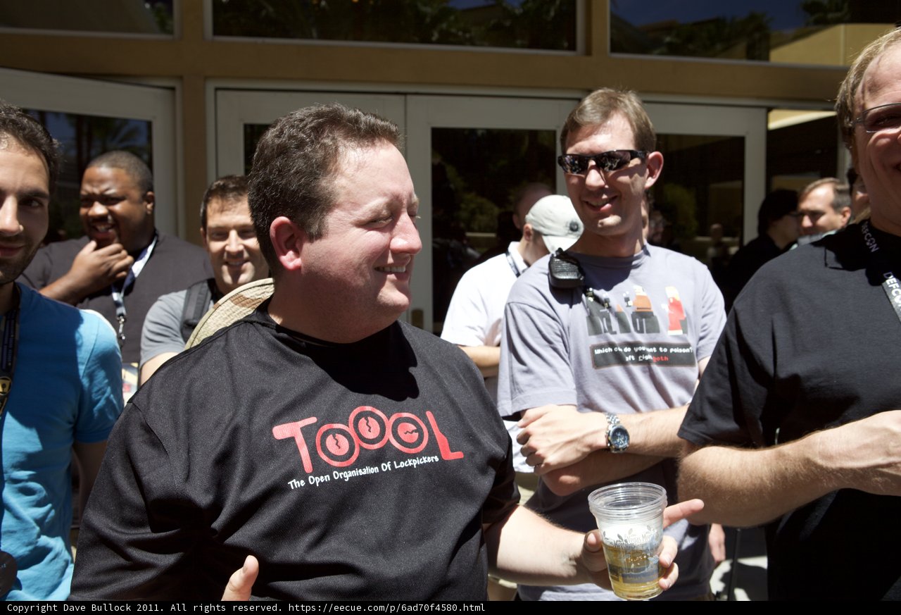 Black-Shirted Man Enjoying A Cold One