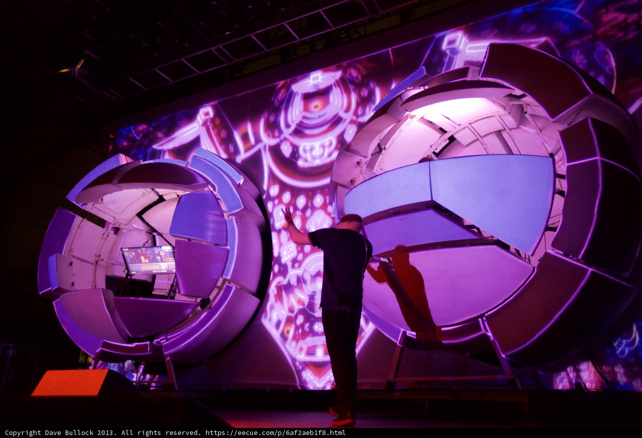 Man in front of a Cosmic Stage
