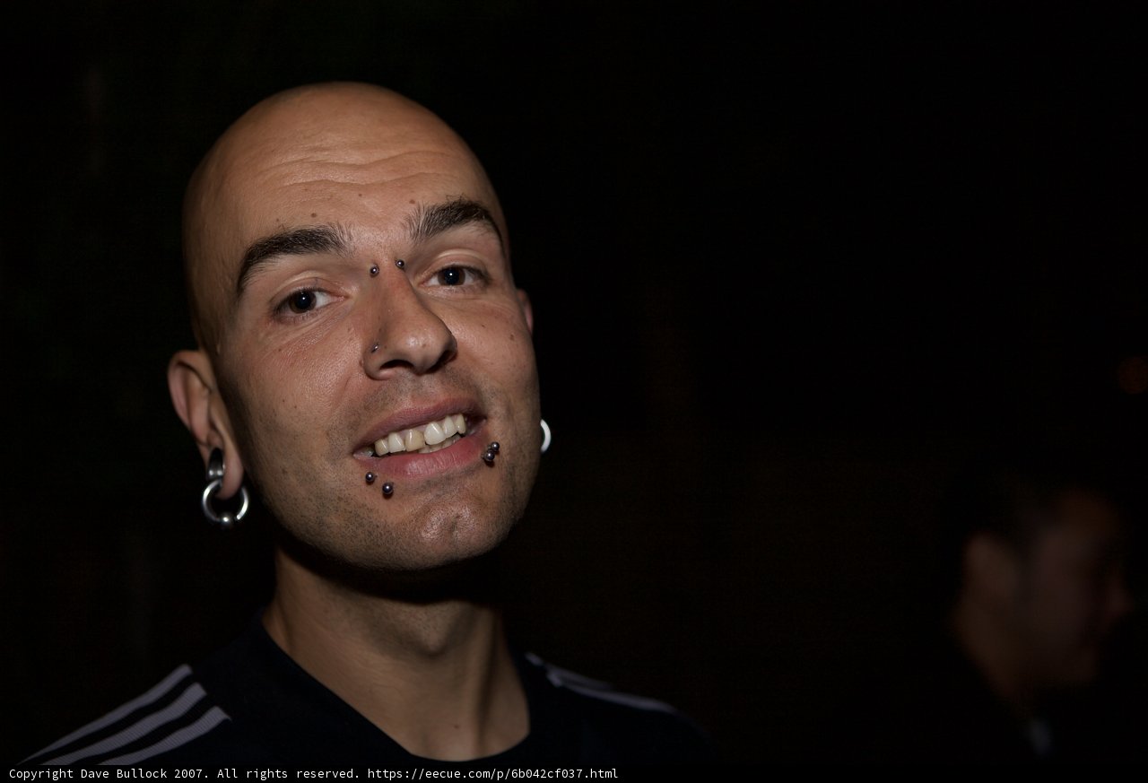 Bald Man with Piercings