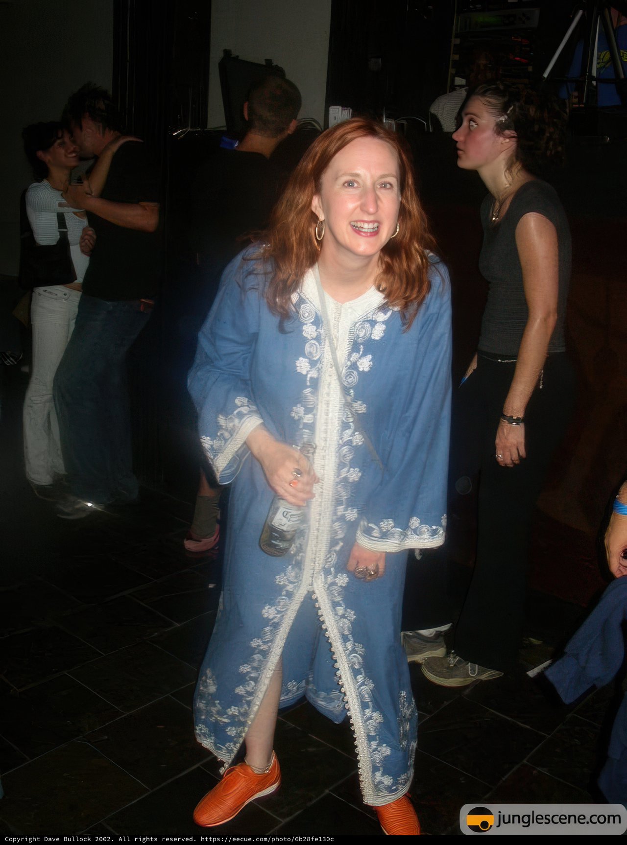 Woman in Blue Robe and Orange Shoes