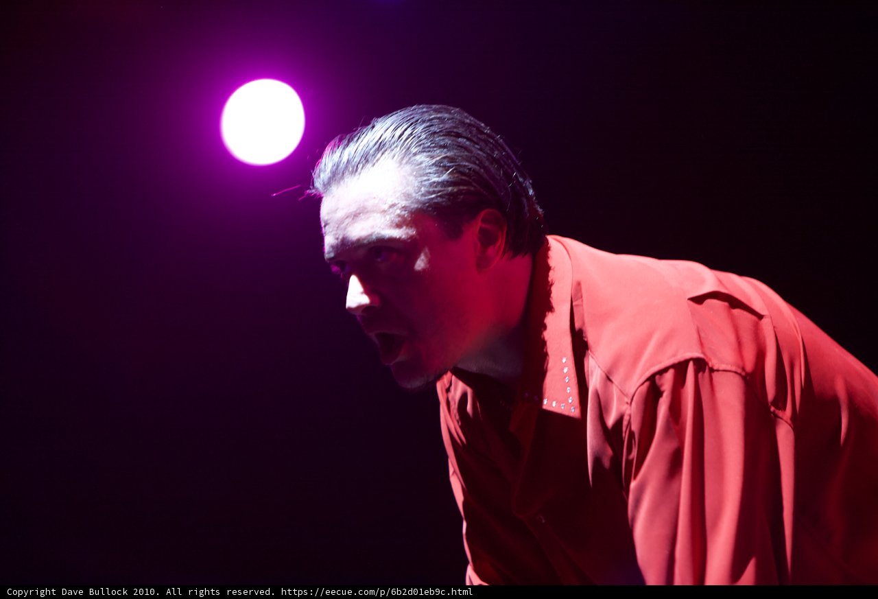 Red-Shirted Performer Shines Under the Stars